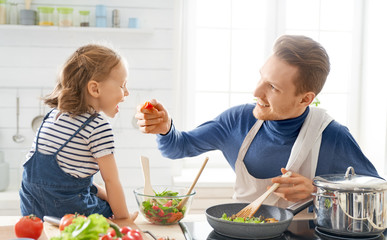 Happy family in the kitchen.