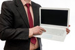© RomanR - Man holding white laptop on white background