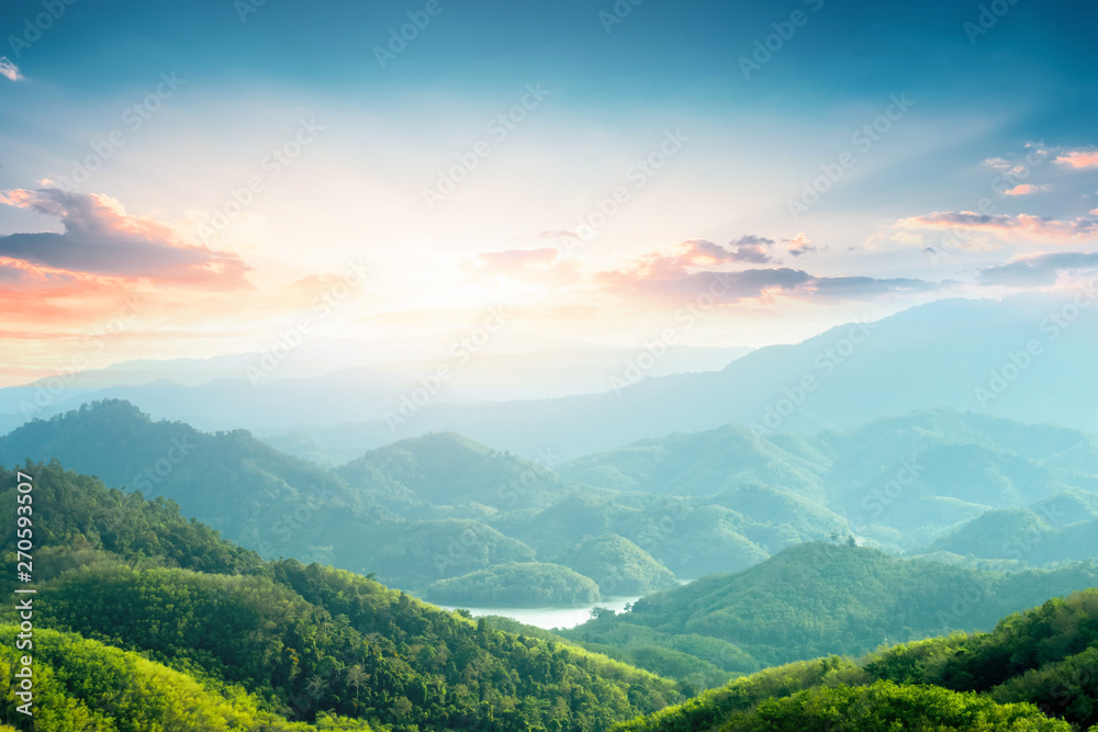 World Environment Day concept: Green mountains and beautiful sky clouds under the blue sky