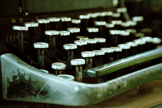 Old typewriter in antique photography vintage simulated, grunge photo