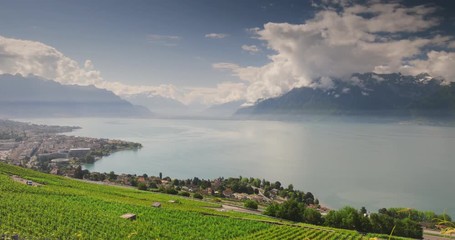 Wall Mural - Panorama view of Montreux city with Swiss Alps, lake Geneva and vineyard on Lavaux region, Canton Vaud, Switzerland, Europe.