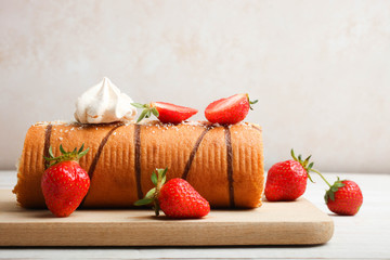 Wall Mural - Sweet roll with chocolate topping, strawberries and meringues