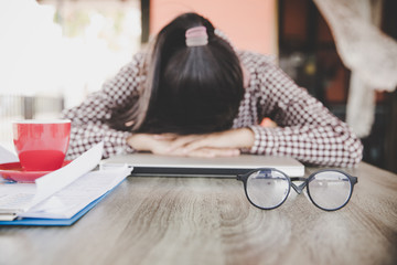 Stressed frustrated young woman employee feeling pain unwell dizzy, tired of difficult office job, suffering from panic attack, hormone imbalance or having headache migraine massaging temples at work