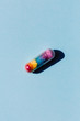 © Kaat Zoetekouw/Stocksy - Pill that makes people feel better on a baby blue background