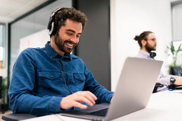 Colleagues working in a modern office.
