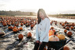© Take A Pix Media, LLC/Stocksy - Asian Woman Holding a Pumpkin During Fall Season