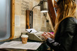 © Marco Govel/Stocksy - Female writer working