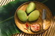 © Maki Company Limited/Stocksy - Fresh green mango with salt mix chili.