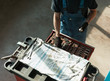 © Milles Studio/Stocksy - Crop technician taking tools out of case