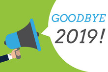 Text Sign Showing Goodbye 2019. Conceptual Photo New Year Eve Milestone Last Month Celebration Transition Man Holding Megaphone Loudspeaker Speech Bubble Message Speaking Loud