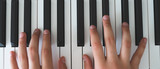 piano keys and playing piano