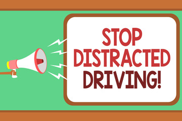 Wall Mural - Word writing text Stop Distracted Driving. Business concept for asking to be careful behind wheel drive slowly Man holding megaphone loudspeaker speech bubble message speaking loud