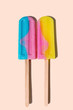© Kaat Zoetekouw/Stocksy - Two icecream lollies on a wooden stick