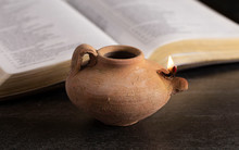Lit Ancient Oil Lamp With An Open Bible Thy Word Is A Lamp Unto My Feet