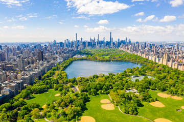 Fototapete - Aerial view of the Central park in New York with golf fields and tall skyscrapers surrounding the park.