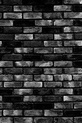 Wall Mural - Black brick wall as a background or texture