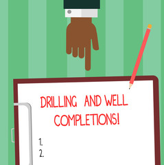 Poster - Writing note showing Drilling And Well Completions. Business photo showcasing Oil and gas petroleum industry engineering Hu analysis Hand Pointing Down to Clipboard with Paper and Pencil