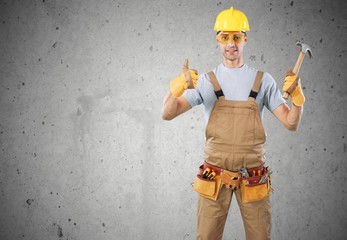 Poster - Worker with a tool belt. Isolated over white background.