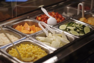 all you can eat buffet food tray salad bar SELECTIVE FOCUS