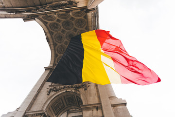 Flag of Belgium on the Arc de Triomphe in Parc du Cinquantenaire