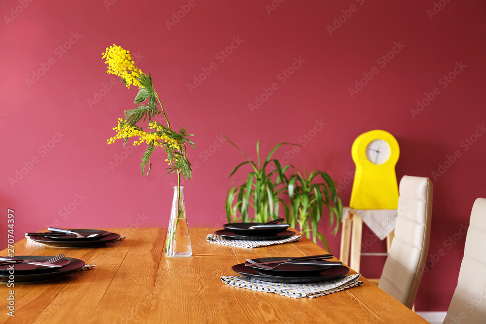 Table served for dinner in dining room