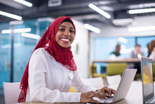 Black Muslim Business Woman ,working On Laptop Computer