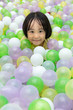 Leinwandbild Motiv Asian Chinese little Girl Playing At Balls Pool