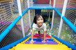 Leinwandbild Motiv Asian Chinese little girl climbing stairs