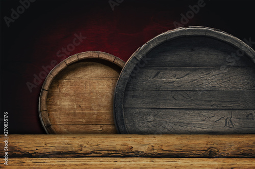 Fotografía Wooden barrel background and worn old table of wood.