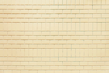 Old beige  brick wall background texture