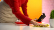 © motortion - Waitress wiping table after customers in fast food restaurant, part-time job