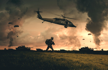 Military helicopter, forces and tanks in the farm to reach city center at sunset