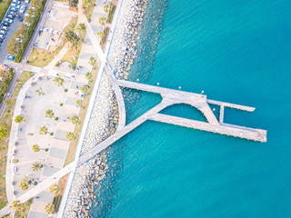 Wall Mural - Aerial top down view of Limassol promenade and pedestrian sea bridge