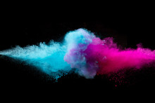 Colored Powder Collision On Black Background. Freeze Motion.