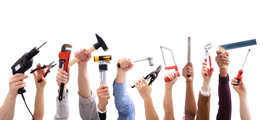 Wall Mural - Group Of People's Hand Holding Carpentry Tools