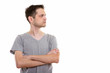 © Ranta Images - Profile view of angry young man with arms crossed