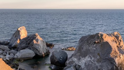 Wall Mural - View of the stone beach and the Black Sea on the southern coast of the Crimea peninsula