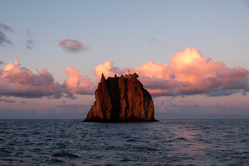 lonely island with lighthouse by sunset, Strombolicchio, isole Eolie