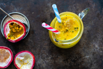 Canvas Print - Tropical smoothie with mango and passion fruit - top view