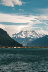 Naklejka na meble Lake Geneva and snow capped mountains in Switzerland