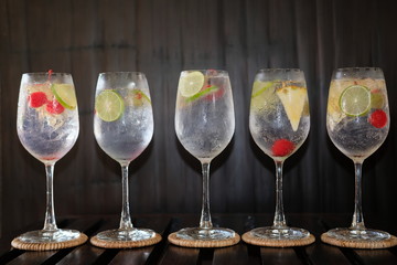 summer drinks of gin tonic alcoholic cocktails on table