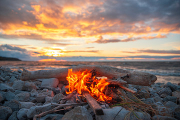 Poster - fire burns near the sea