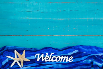 Wall Mural - Welcome sign with beach towel and starfish border