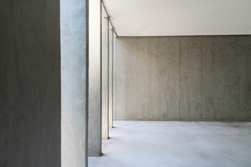 Wall Mural - Concrete wall with lateral sunlight.