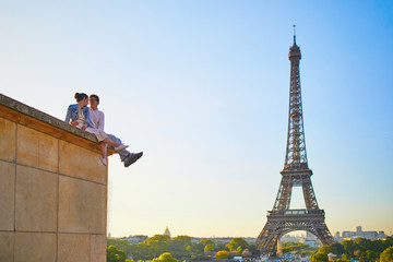 Happy romantic couple in Paris, near the Eiffel tower