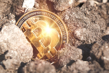 Shine bitcoin cryptocurrency on a stone background