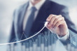© oatawa - Development and growth concept. Businessman plan growth and increase of positive indicators in his business.