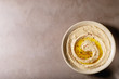Hummus with olive oil in ceramic bowl