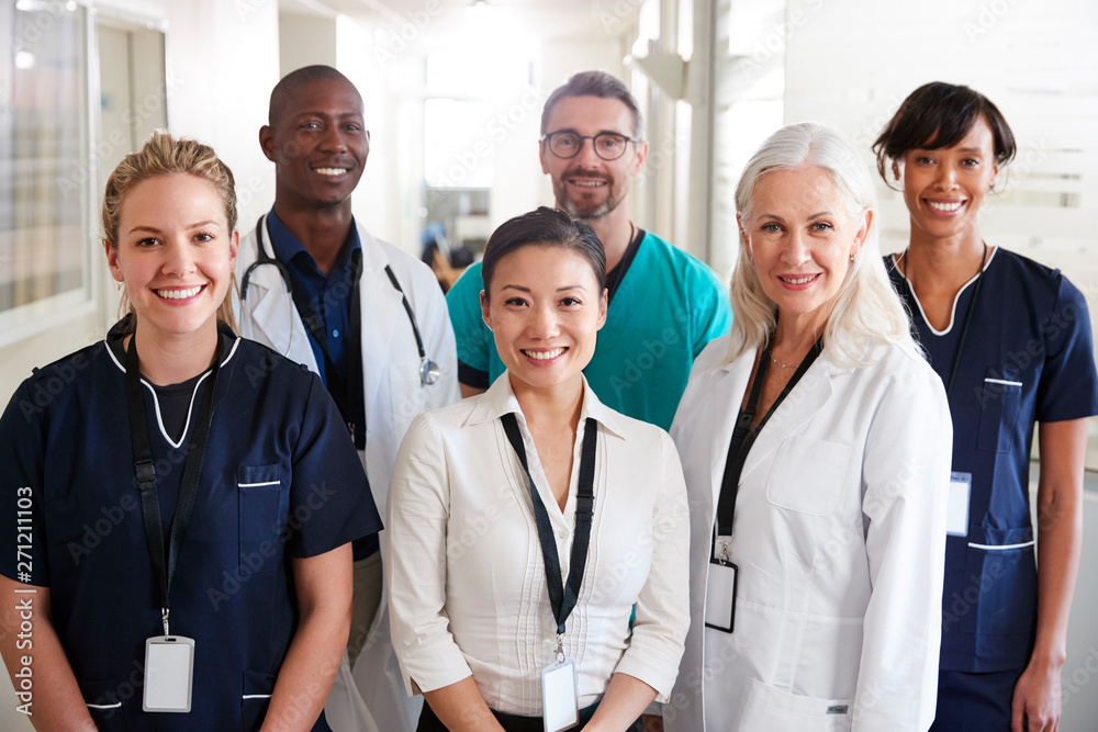 Portrait Of Medical Team Standing In Hospital Corridor Stock Photo ...