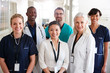 © Monkey Business - Portrait Of Medical Team Standing In Hospital Corridor